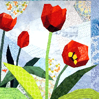 Red Tulips pieced quilt by Amy Krasnansky